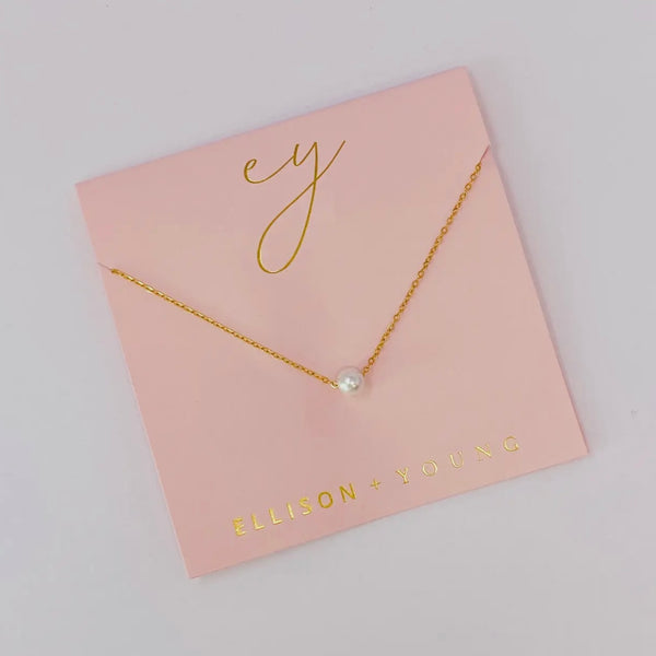 Dainty single pearl necklace