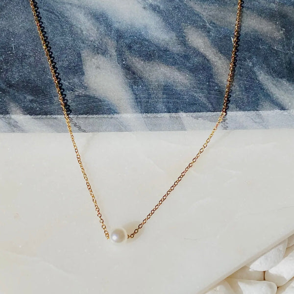 Dainty single pearl necklace
