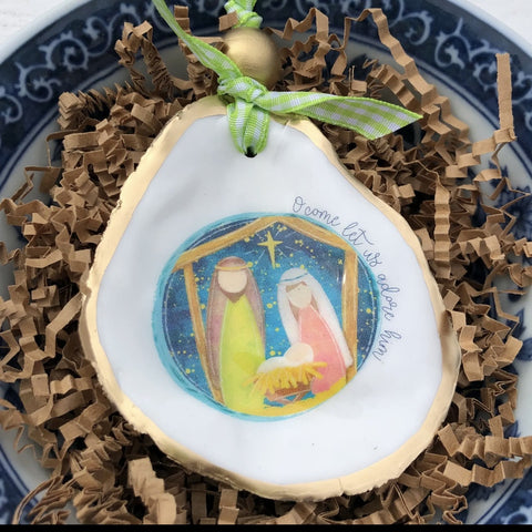Oyster shell ornament. Oh come, let us adore him.