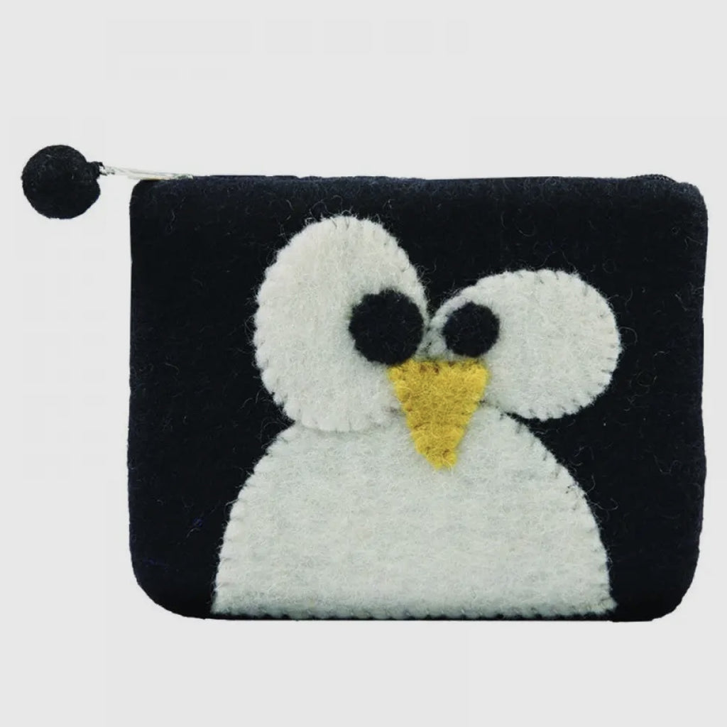 Penguin face black and white coin purse with inside lining.