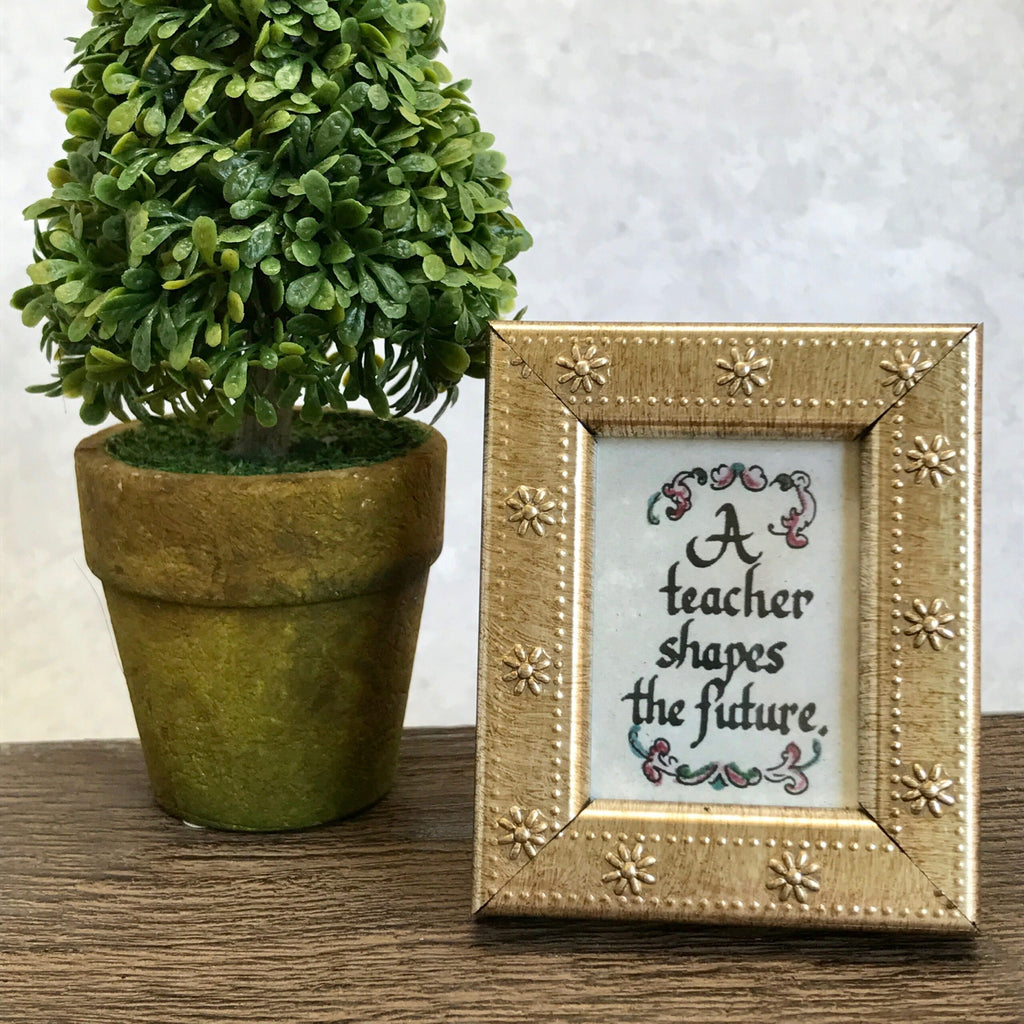 “A Teacher shapes...”Framed Calligraphy Quote Mini