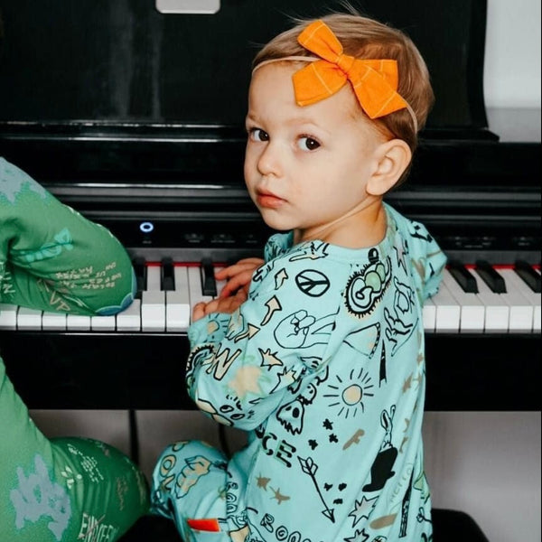 “Dannie” Snugsuit Graffiti Teal Romper Unisex